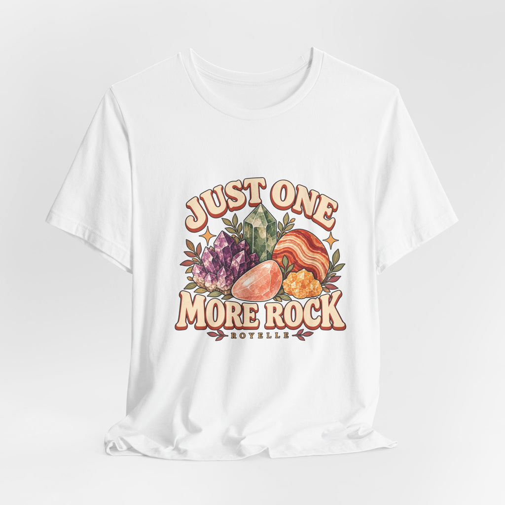 Royelle Just One More Rock T-shirt in White, hanging front view, with colorful illustrated minerals and slogan.