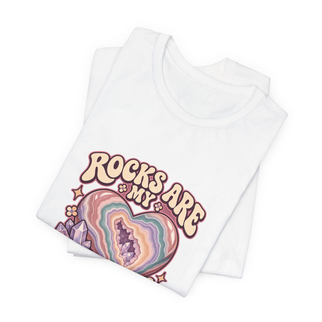 Royelle Rocks Are My Love Language T-shirt in White, folded front view, with pastel agate heart, crystals and flowers and slogan.
